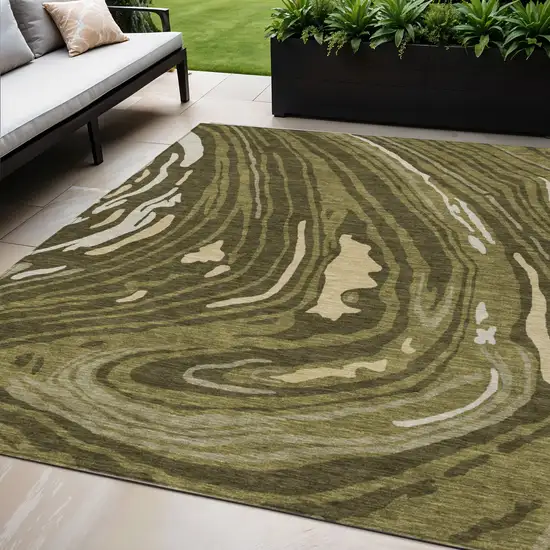 Olive Green And Beige Abstract Washable Indoor Outdoor Area Rug Photo 1
