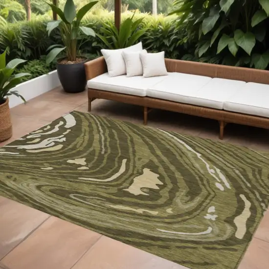 Olive Green And Beige Abstract Washable Indoor Outdoor Area Rug Photo 1