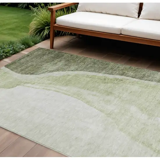 Olive Green And Beige Abstract Washable Indoor Outdoor Area Rug Photo 1