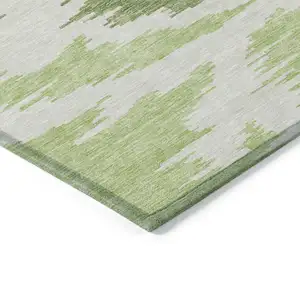 Photo of Olive Green And Beige Abstract Washable Indoor Outdoor Area Rug