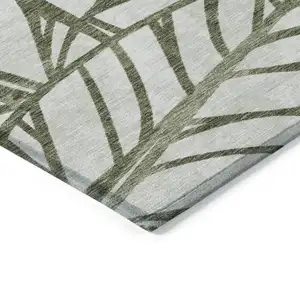 Photo of Olive Green And Beige Floral Washable Indoor Outdoor Area Rug