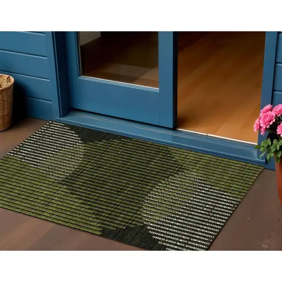 Olive Green And Black Geometric Washable Indoor Outdoor Area Rug Photo 1
