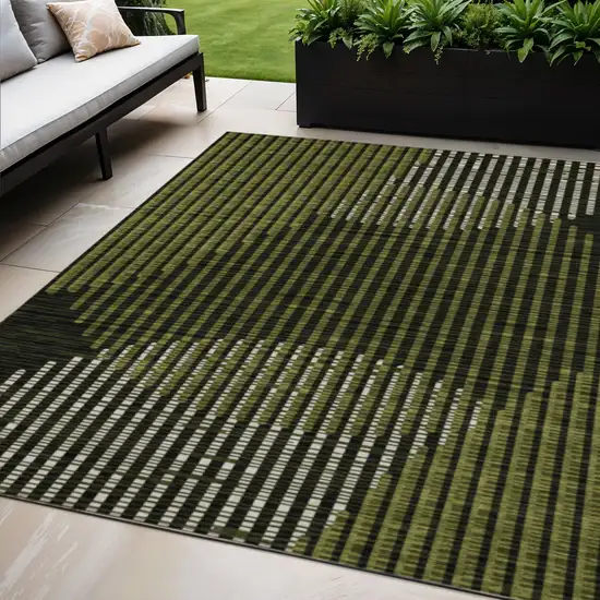 Olive Green And Black Geometric Washable Indoor Outdoor Area Rug Photo 1