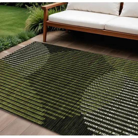 Olive Green And Black Geometric Washable Indoor Outdoor Area Rug Photo 1