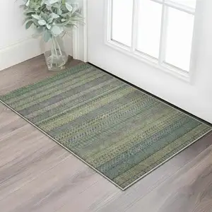 Photo of Olive Green And Blue Striped Washable Area Rug With UV Protection