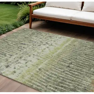 Photo of Olive Green And Copper Abstract Washable Indoor Outdoor Area Rug