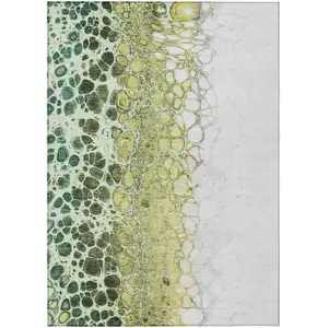 Photo of Olive Green And Gold Abstract Washable Indoor Outdoor Area Rug