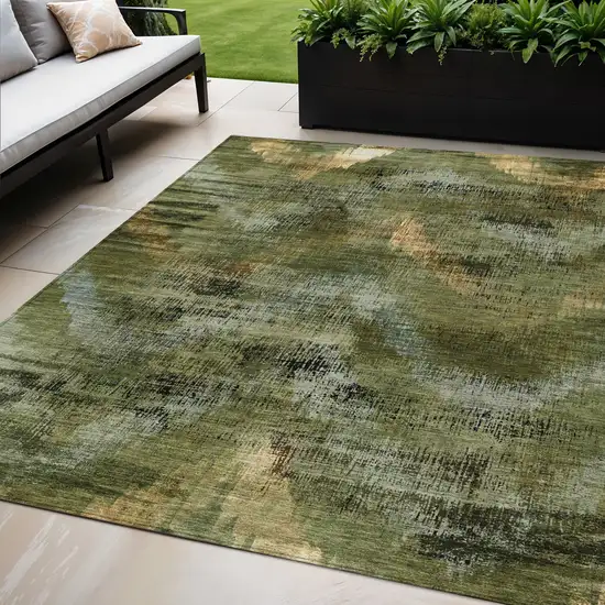 Olive Green And Gold Abstract Washable Indoor Outdoor Area Rug Photo 1
