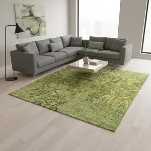 Photo of Olive Green And Gold Floral Washable Area Rug With UV Protection