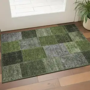 Photo of Olive Green And Gray Patchwork Washable Area Rug With UV Protection