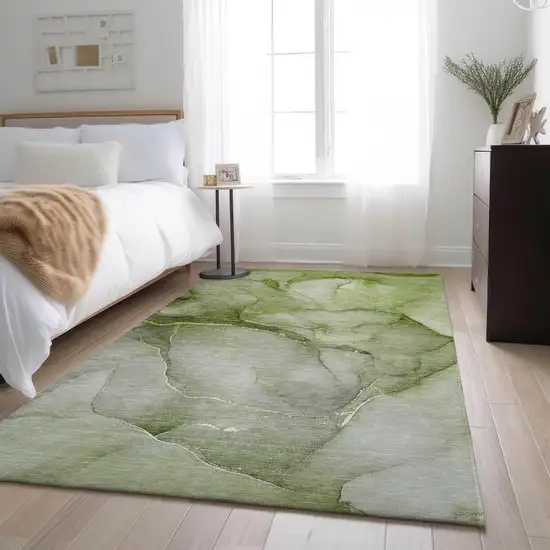 Olive Green And Ivory Abstract Washable Area Rug With UV Protection Photo 4