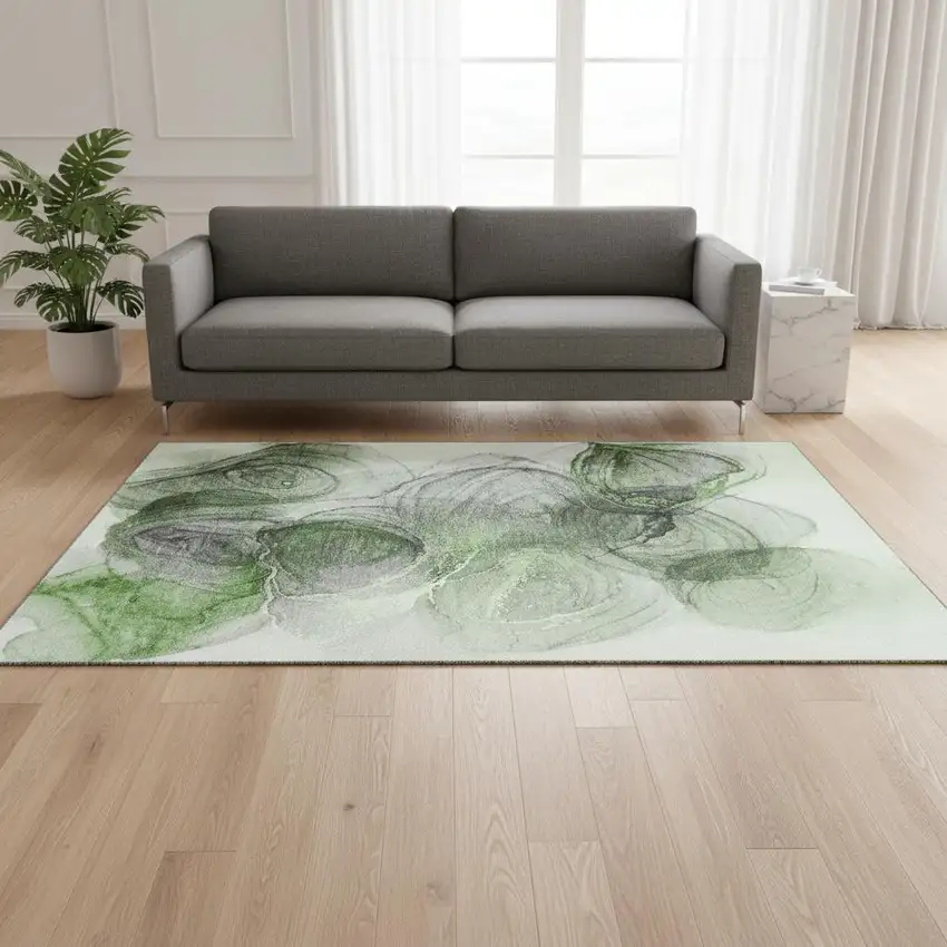 Olive Green And Ivory Abstract Washable Area Rug With UV Protection Photo 1
