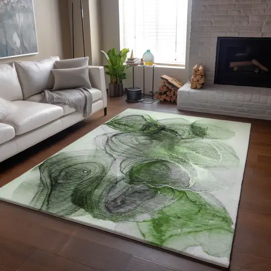 Olive Green And Ivory Abstract Washable Area Rug With UV Protection Photo 6