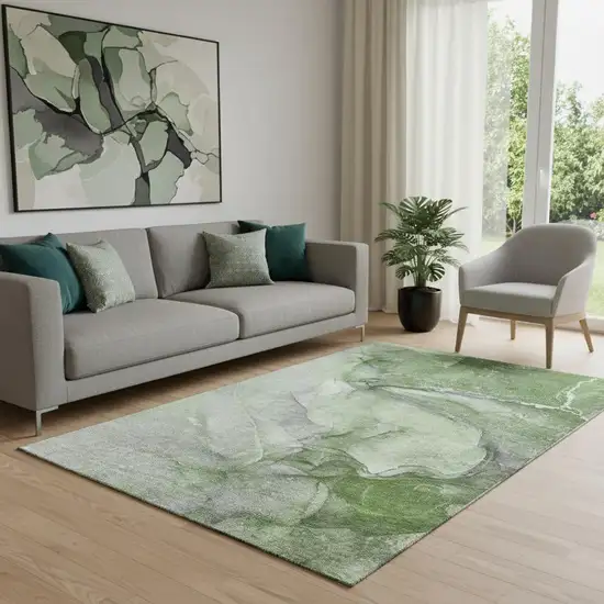 Olive Green And Ivory Abstract Washable Area Rug With UV Protection Photo 1