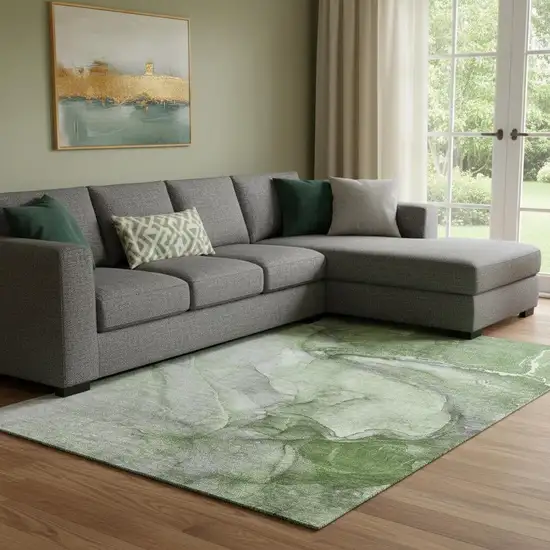 Olive Green And Ivory Abstract Washable Area Rug With UV Protection Photo 1