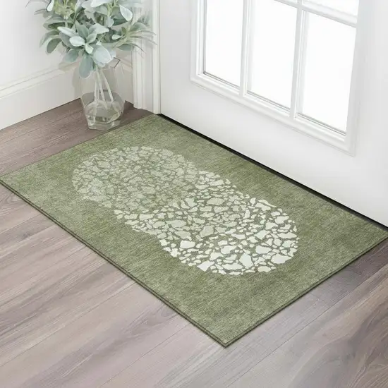 Olive Green And Ivory Abstract Washable Area Rug With UV Protection Photo 1