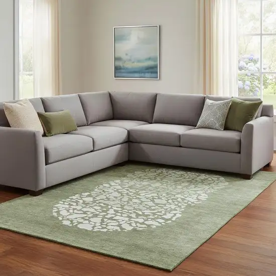 Olive Green And Ivory Abstract Washable Area Rug With UV Protection Photo 1