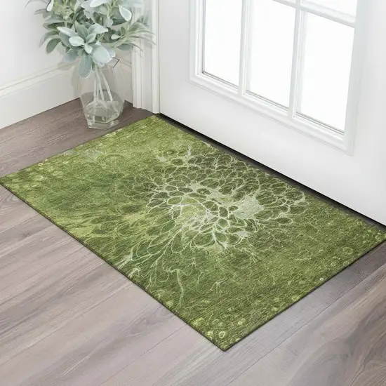 Olive Green And Ivory Abstract Washable Area Rug With UV Protection Photo 1