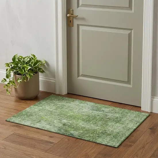 Olive Green And Ivory Abstract Washable Area Rug With UV Protection Photo 1