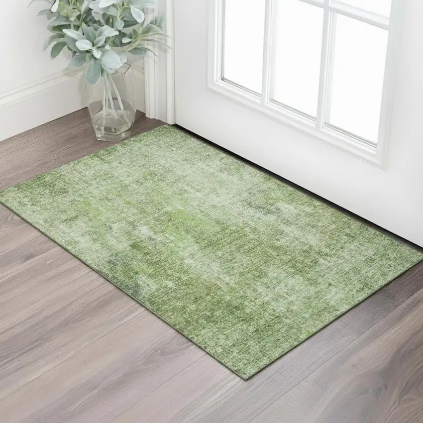 Olive Green And Ivory Abstract Washable Area Rug With UV Protection Photo 1