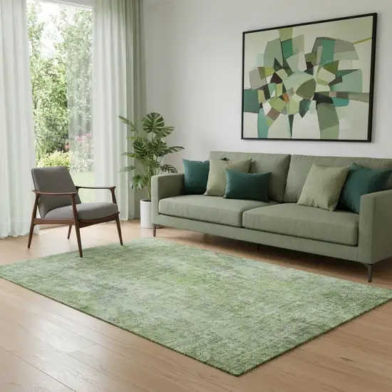 Olive Green And Ivory Abstract Washable Area Rug With UV Protection Photo 1