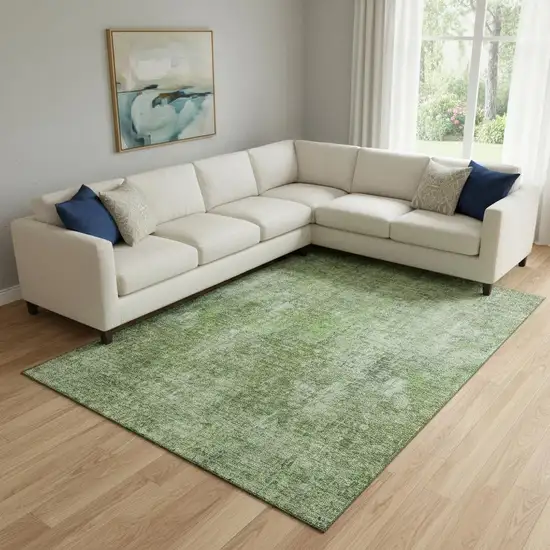 Olive Green And Ivory Abstract Washable Area Rug With UV Protection Photo 1