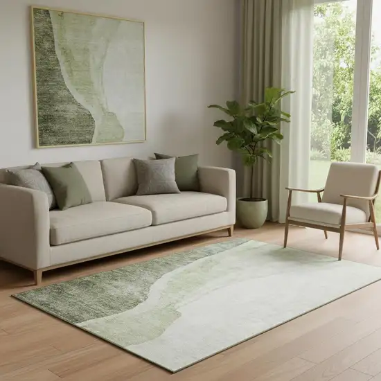 Olive Green And Ivory Abstract Washable Area Rug With UV Protection Photo 1