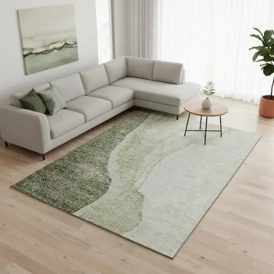 Olive Green And Ivory Abstract Washable Area Rug With UV Protection Photo 1