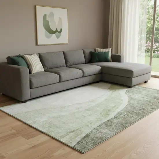 Olive Green And Ivory Abstract Washable Area Rug With UV Protection Photo 1