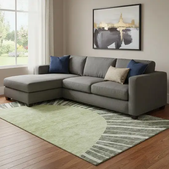 Olive Green And Ivory Abstract Washable Area Rug With UV Protection Photo 1