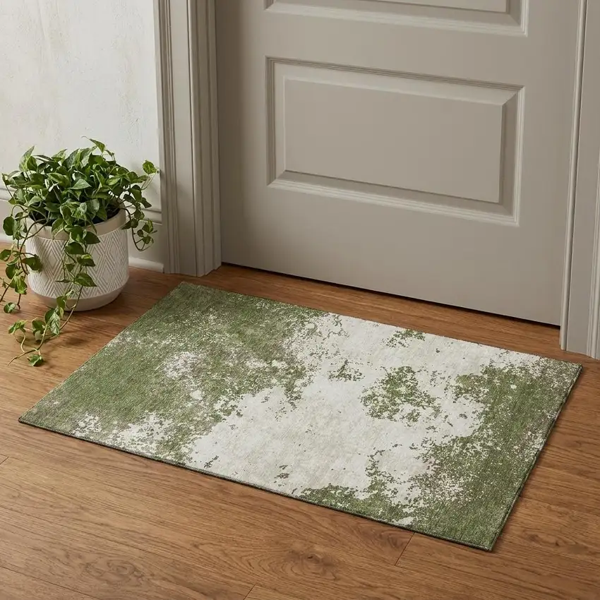 Olive Green And Ivory Abstract Washable Area Rug With UV Protection Photo 1