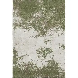 Photo of Olive Green And Ivory Abstract Washable Area Rug With UV Protection