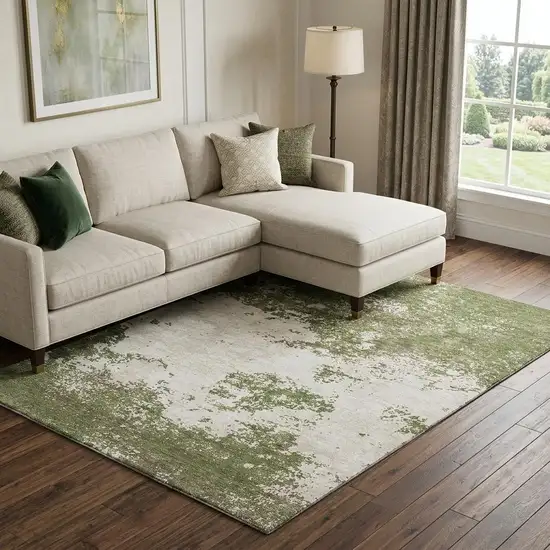 Olive Green And Ivory Abstract Washable Area Rug With UV Protection Photo 1