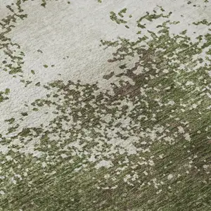 Photo of Olive Green And Ivory Abstract Washable Area Rug With UV Protection