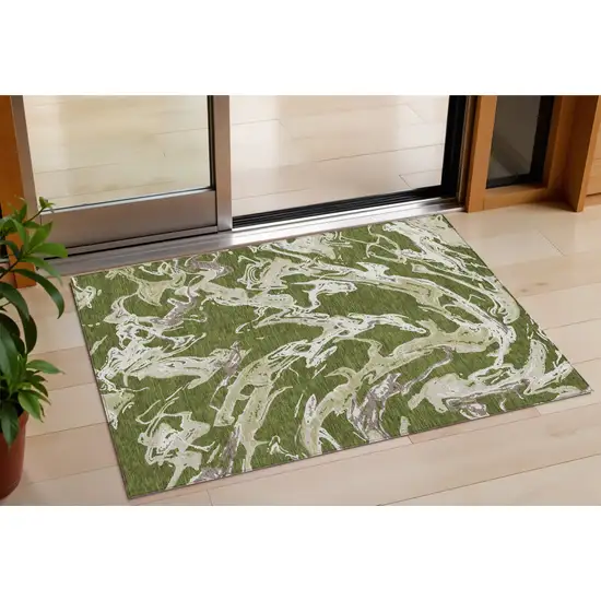 Olive Green And Ivory Abstract Washable Indoor Outdoor Area Rug Photo 1