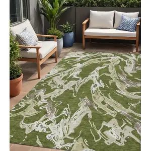 Photo of Olive Green And Ivory Abstract Washable Indoor Outdoor Area Rug
