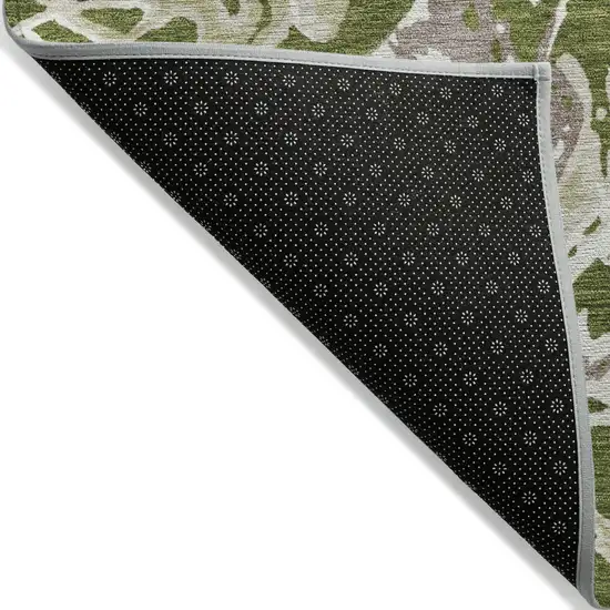 Olive Green And Ivory Abstract Washable Indoor Outdoor Area Rug Photo 4