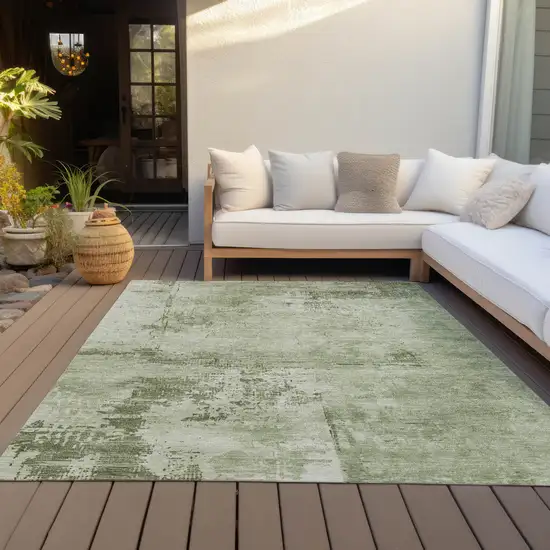 Olive Green And Ivory Abstract Washable Indoor Outdoor Area Rug Photo 9
