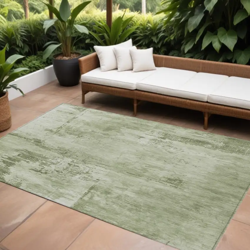 Olive Green And Ivory Abstract Washable Indoor Outdoor Area Rug Photo 1