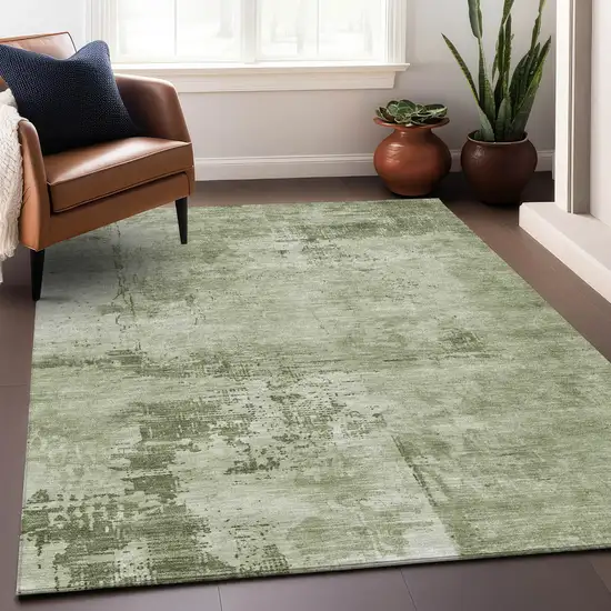 Olive Green And Ivory Abstract Washable Indoor Outdoor Area Rug Photo 8