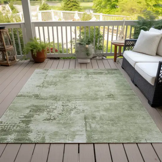 Olive Green And Ivory Abstract Washable Indoor Outdoor Area Rug Photo 7
