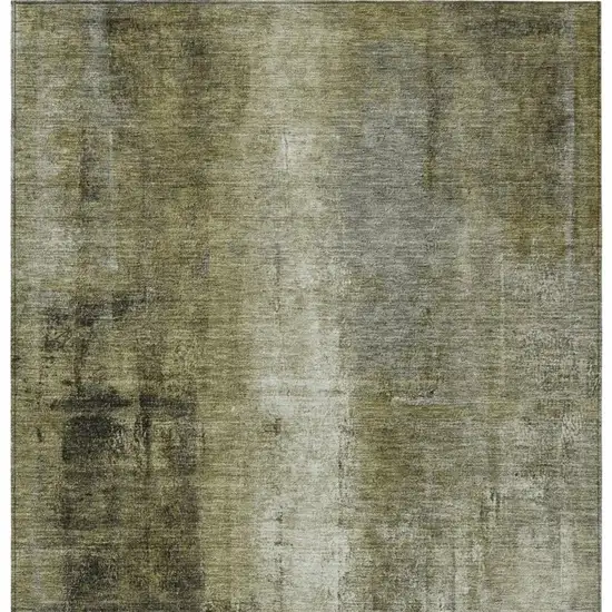 Olive Green And Ivory Abstract Washable Indoor Outdoor Area Rug Photo 3