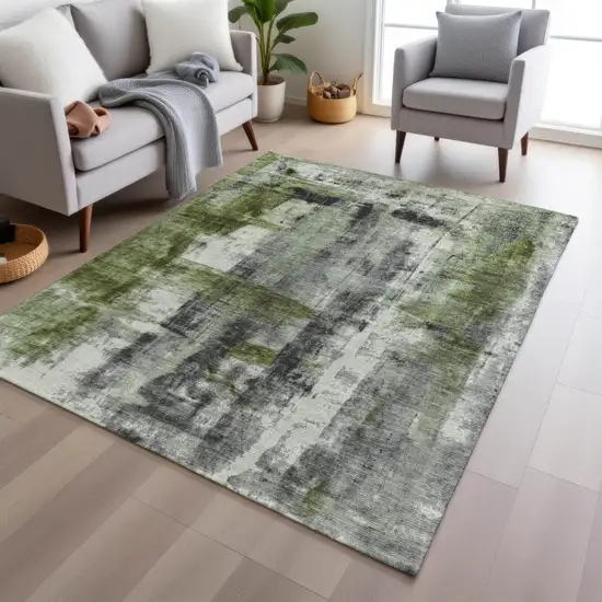 Olive Green And Ivory Abstract Washable Indoor Outdoor Area Rug Photo 6