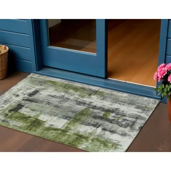 Olive Green And Ivory Abstract Washable Indoor Outdoor Area Rug Photo 2