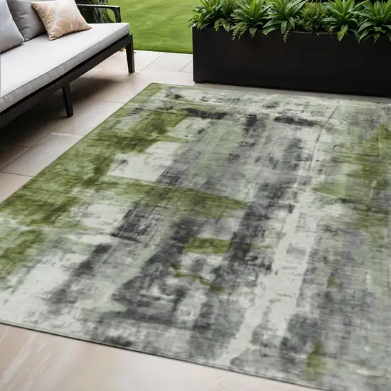 Olive Green And Ivory Abstract Washable Indoor Outdoor Area Rug Photo 2
