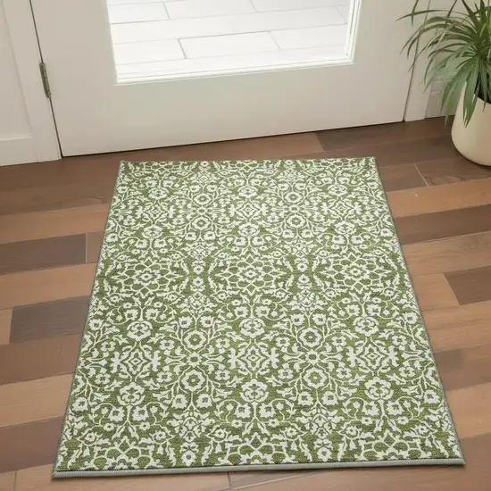 Olive Green And Ivory Damask Washable Area Rug With UV Protection Photo 2