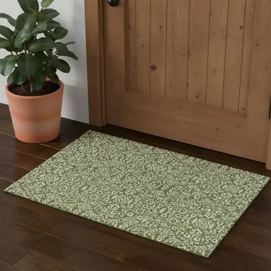 Olive Green And Ivory Damask Washable Area Rug With UV Protection Photo 1