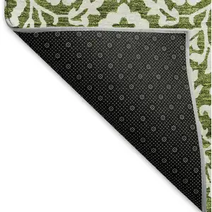 Photo of Olive Green And Ivory Damask Washable Area Rug With UV Protection