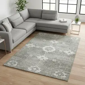 Photo of Olive Green And Ivory Floral Medallion Washable Area Rug With UV Protection