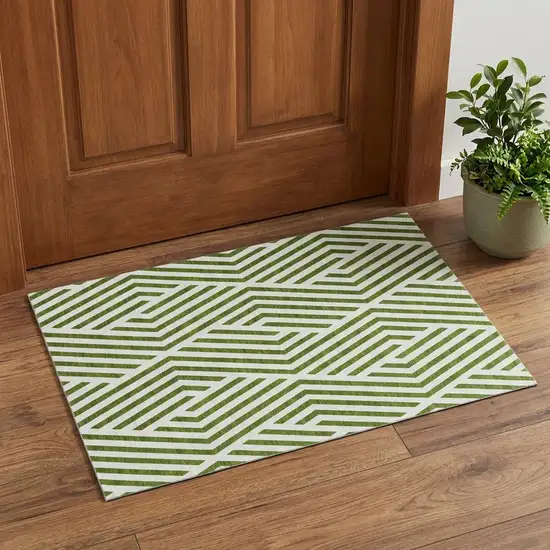 Olive Green And Ivory Geometric Washable Area Rug With UV Protection Photo 1